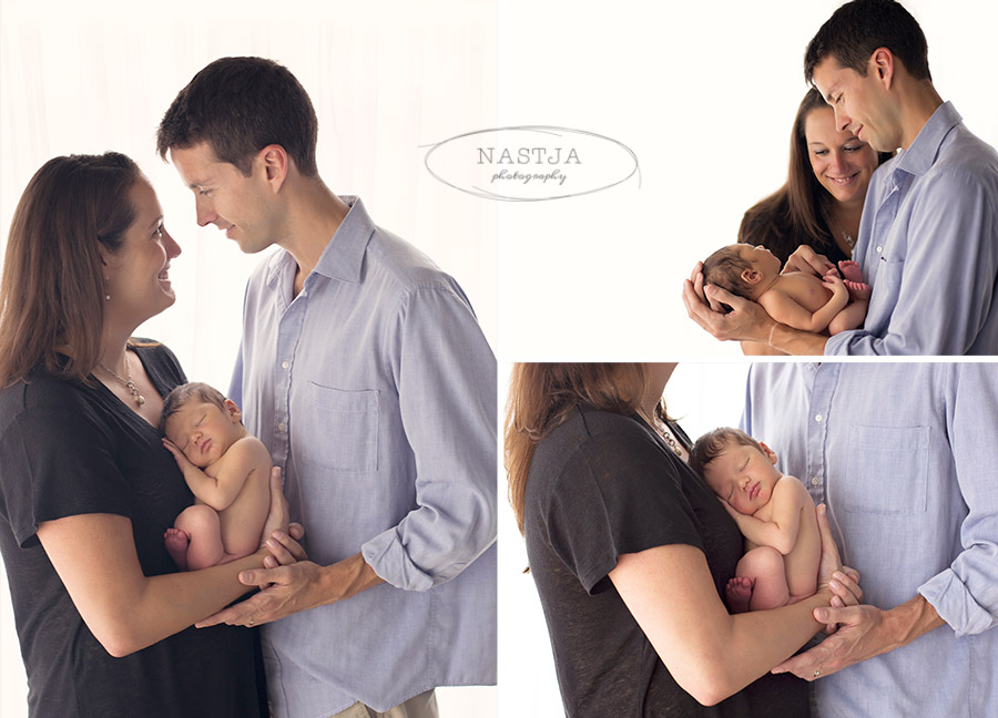 Atlanta Newborn photographer- Family posing with baby in studio