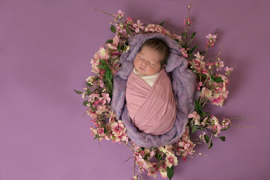 Lawrenceville newborn photographer- baby in flowers- Nastja Photography