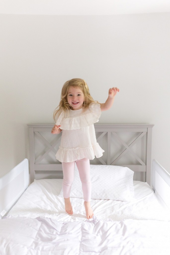 4 year old, big sister, atlanta family photographer, big sister, jumping on bed, bring and airy photo session atalnta