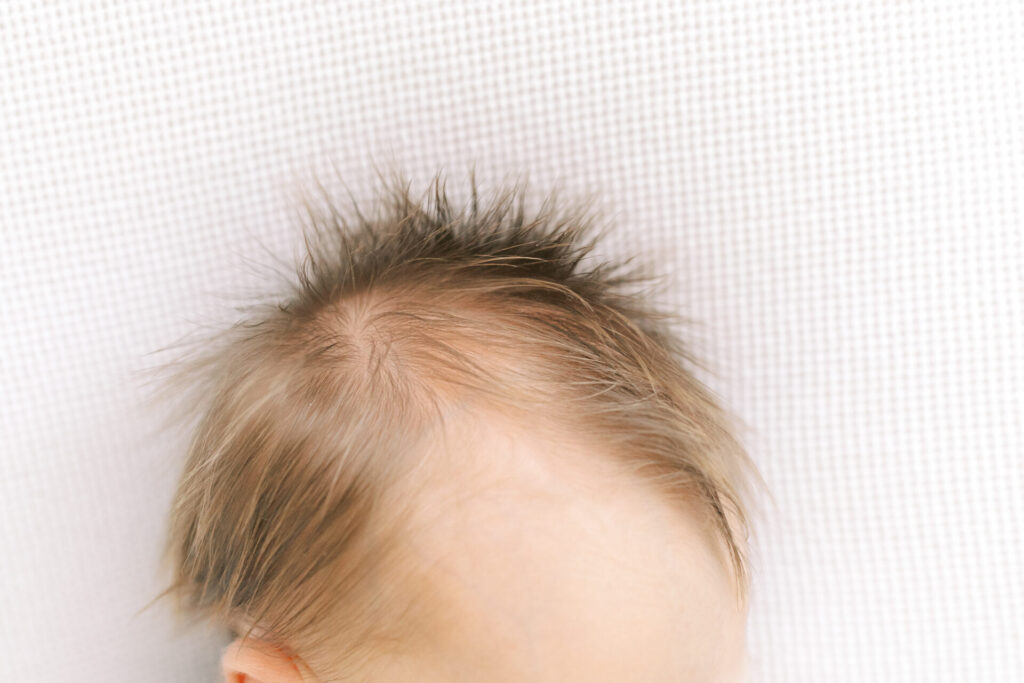 Alpharetta newborn photographer	baby hair