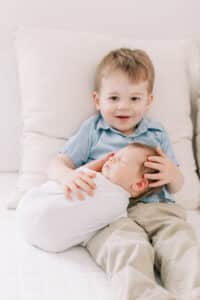 big brother with baby sibling photo Alpharetta newborn photographer