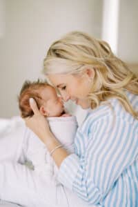 family poses with atlanta newborn photographer
