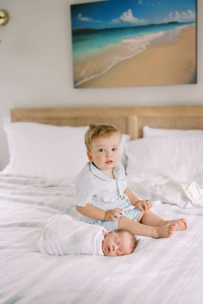 family poses with atlanta newborn photographer