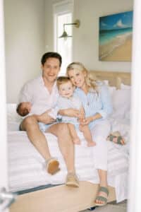 family poses with atlanta newborn photographer